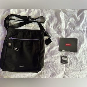Tumi crossbody bag, black, good condition.
